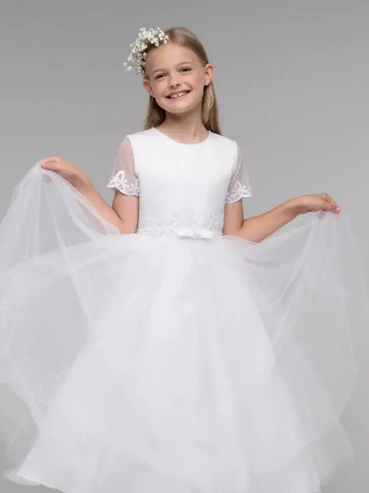 Girl in white ensemble