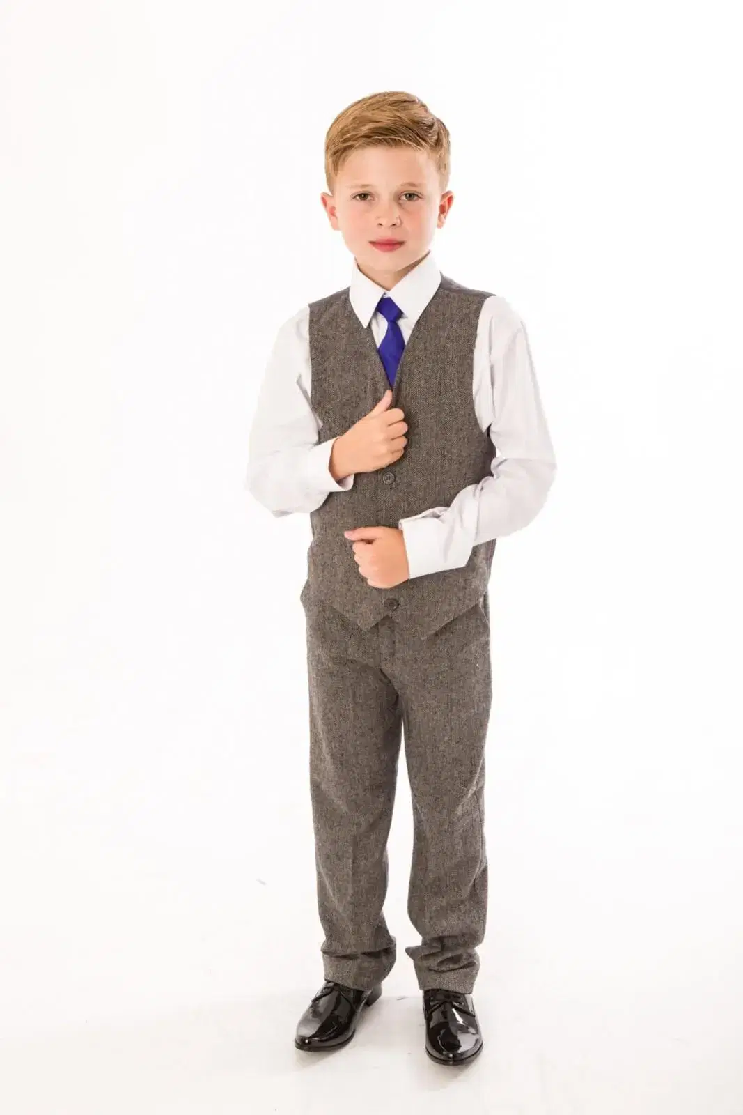 Boy in grey waistcoat