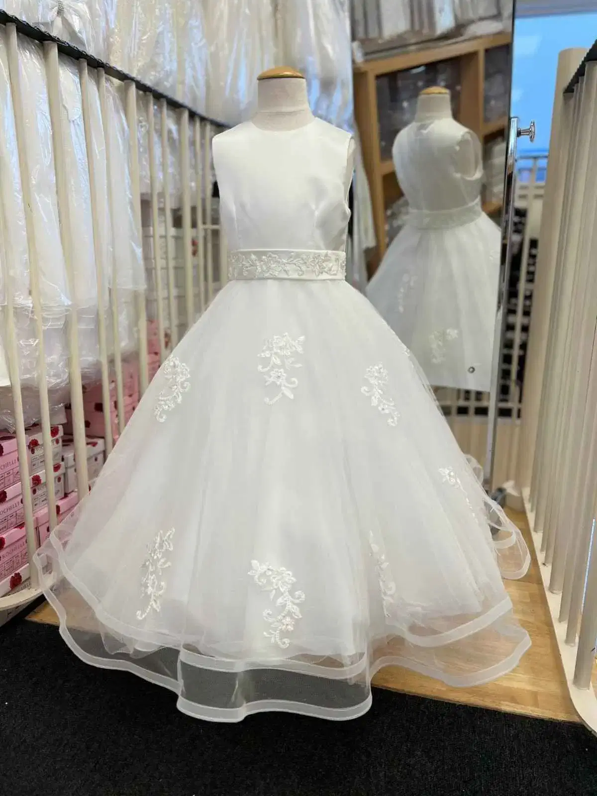 Embroidered white dress in shop