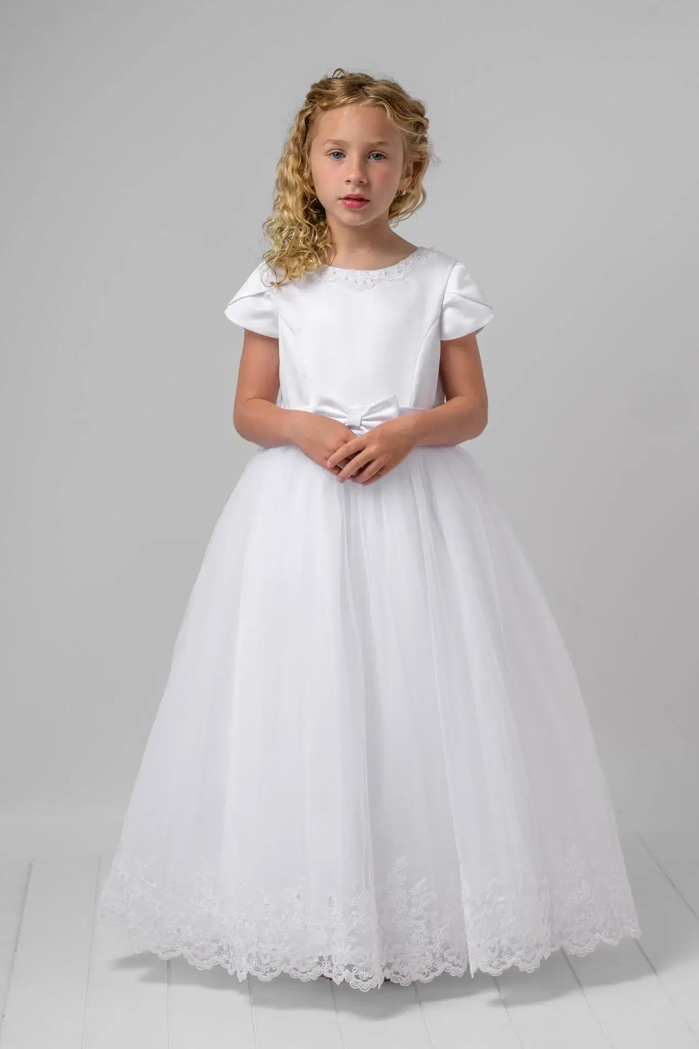 Girl in tiered white gown
