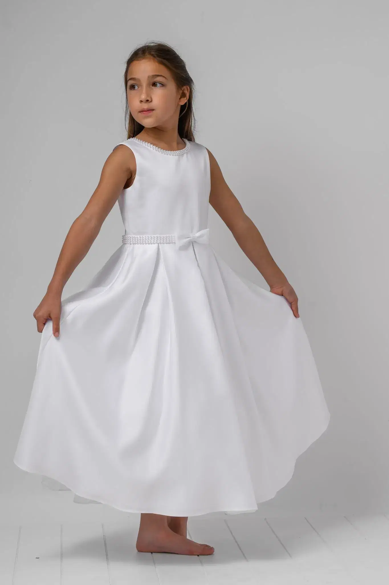 Girl in tiered white gown