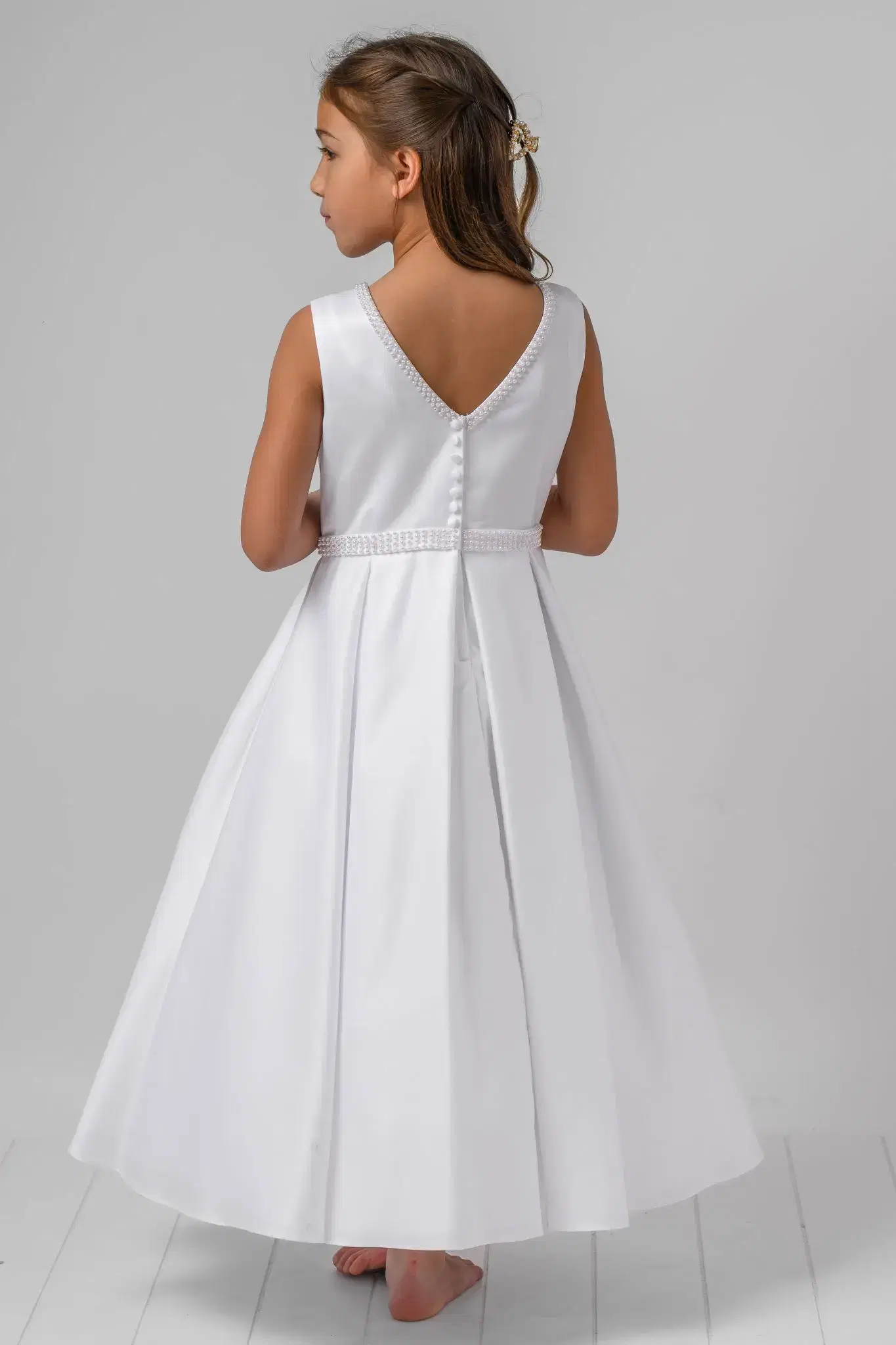 Girl in tiered white gown