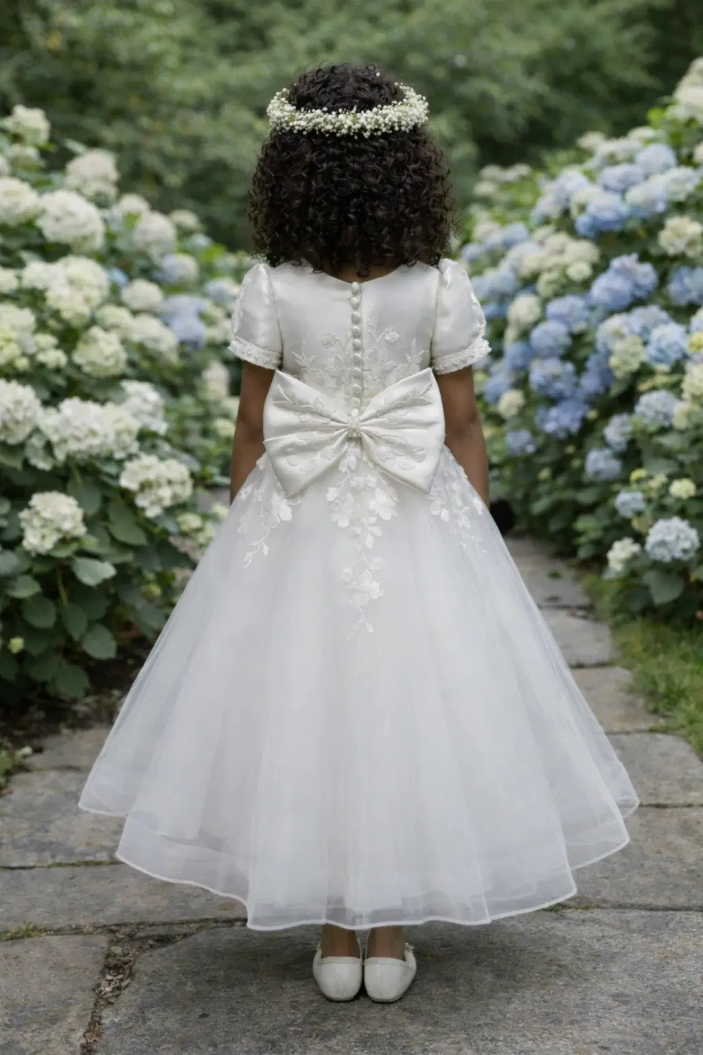 Girl in tiered white gown