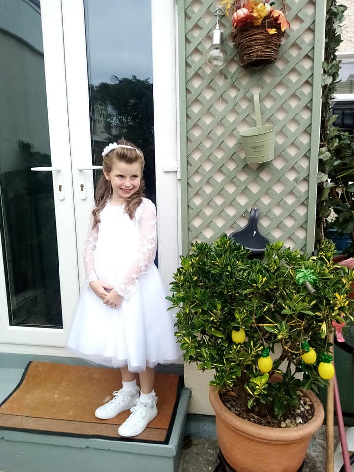 girl wearing white dress paired with shoes