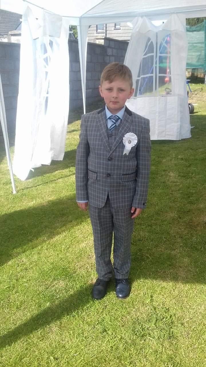 boy wearing suit