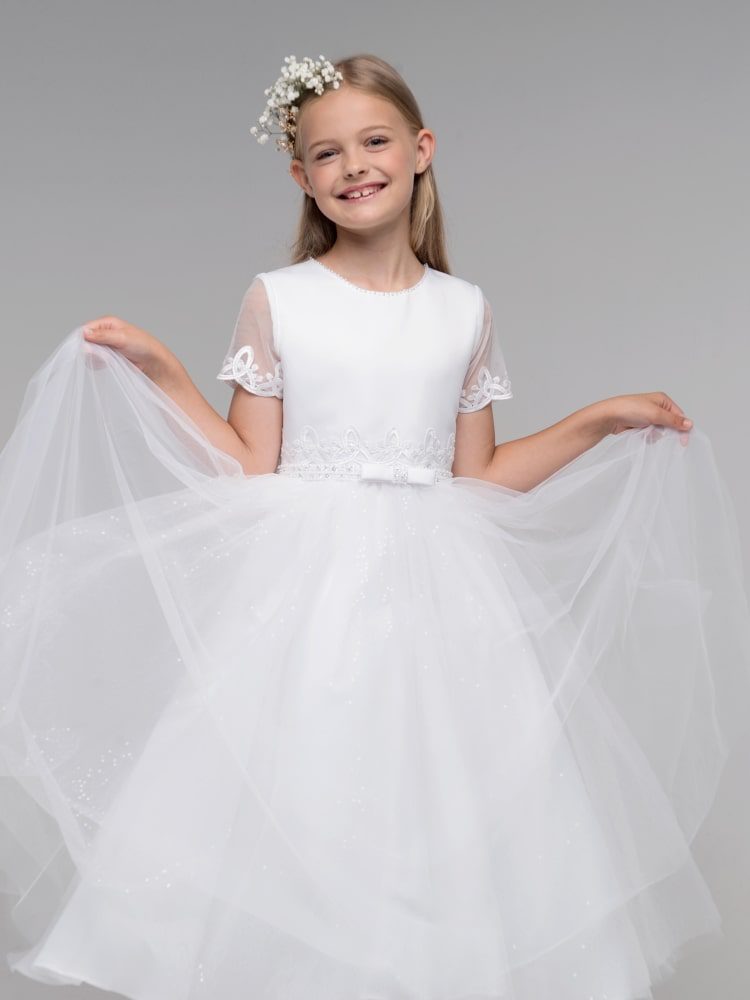 Girl in white ensemble