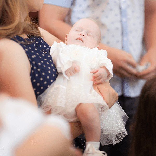 Baby in christening gown